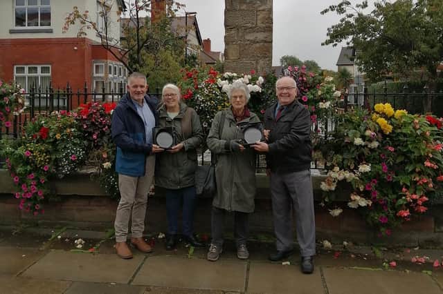 Sheila Livesey and Janice Powell receive Heart of the Community awards from councillors Lawrence Hunt and George Davies