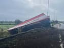 Emergency services including Lancashire Police remain on scene and working with Traffic Officers and recovery contractors to clear the overturned lorry