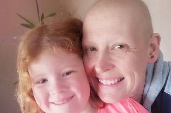Jane and her daughter Charlotte when she lost her hair