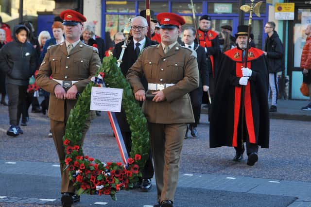 A large wreath from the Mayor of Wigan and the borough's residents