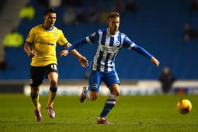 Joe Bennett facing Latics for Brighton in 2014-5