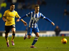 Joe Bennett facing Latics for Brighton in 2014-5