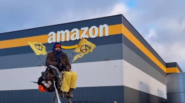 Extinction Rebellion activists blockading one of the UK's largest Amazon depots