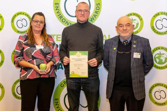 From right: Sue Siddall and David Williamson, the mall’s cleaning team leader and team member with Phil Williams of PLAN-IT EC who presented the award