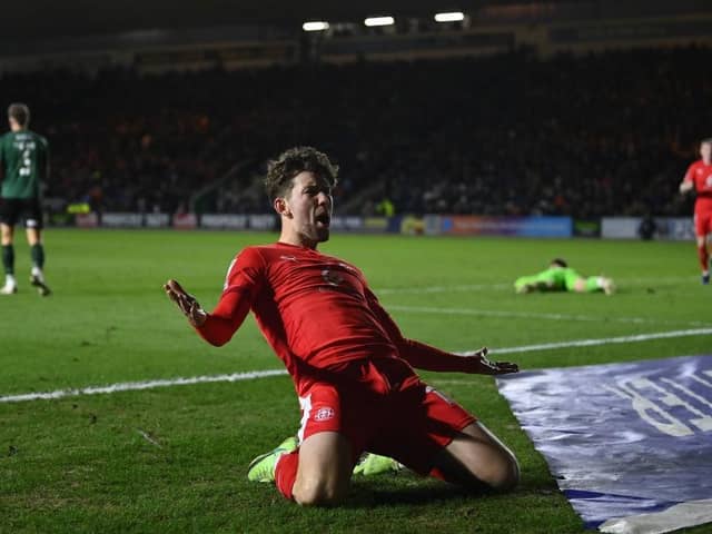 Callum Lang celebrates his winning goal