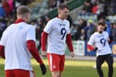 Jason Kerr warming up before the Plymouth game