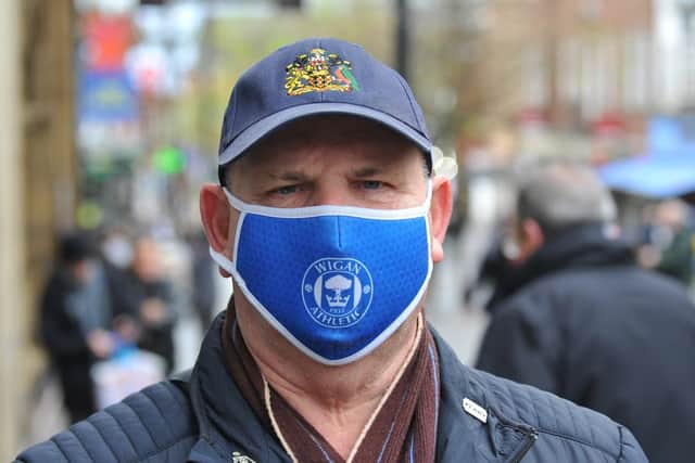 Paul Hogarth says he feels safer wearing a mask