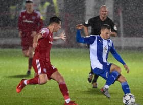 Scott Smith gets stuck in at Accrington