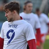 The Wigan players wore a t-shirt to show their support for Charlie Wyke