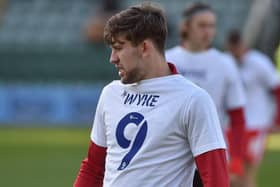 The Wigan players wore a t-shirt to show their support for Charlie Wyke