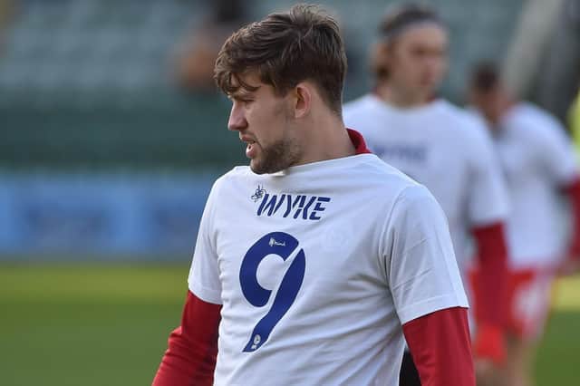 The Wigan players wore a t-shirt to show their support for Charlie Wyke