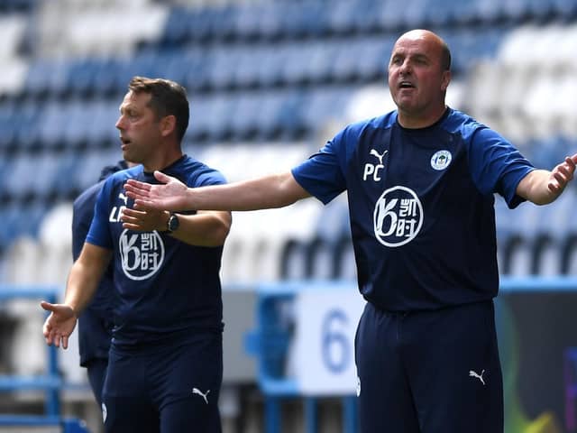 Paul Cook, alongside Leam Richardson