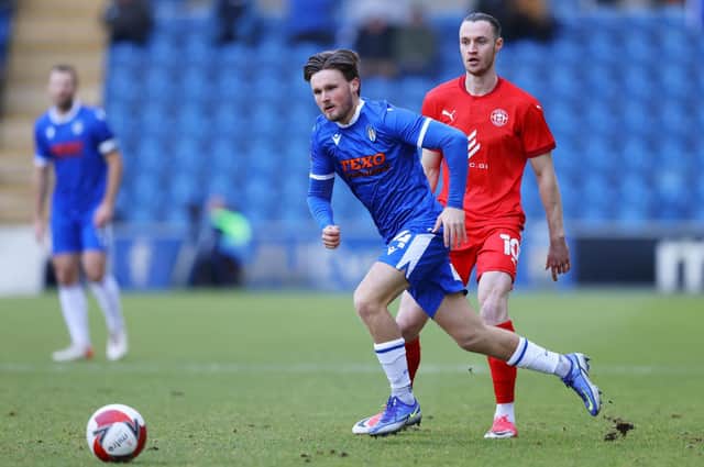 Will Keane in action at Colchester