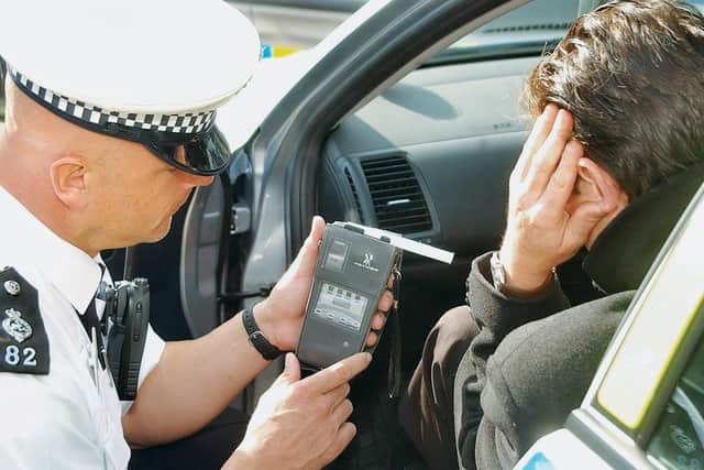 Police doing road side breathalyser test