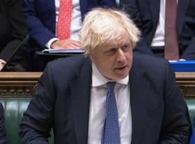 Prime Minister Boris Johnson speaks during Prime Minister's Questions in the House of Commons earlier today