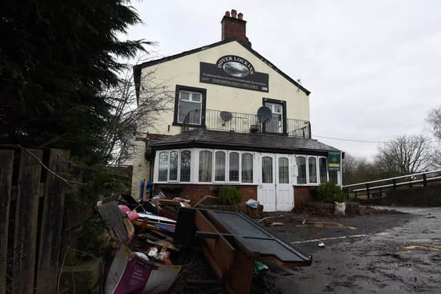 Rubble stacked up outside the pub