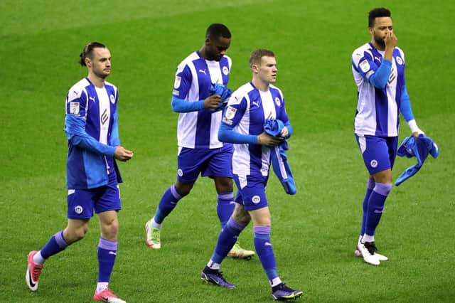 The Latics players ready themselves for the Shrewsbury game