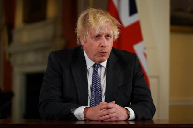 Boris Johnson has issued an appeal to members of the public to step forward to assist the Covid booster jab programme in a race to counter the new Omicron variant