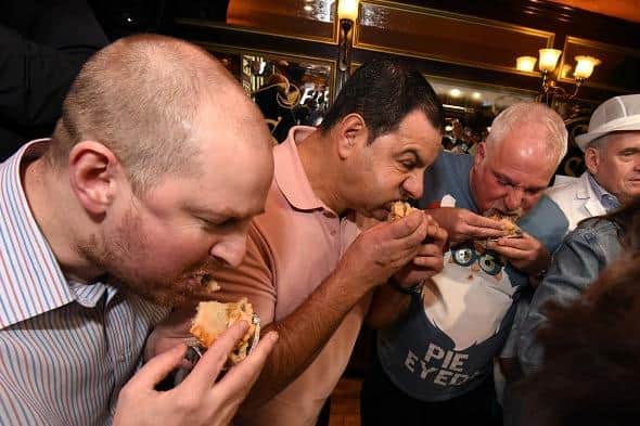 Action from a previous World Pie Eating Championships in Wigan