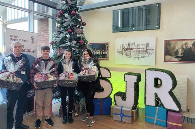 Students at St John Rigby College have been delivering Christmas hampers