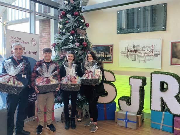 Students at St John Rigby College have been delivering Christmas hampers