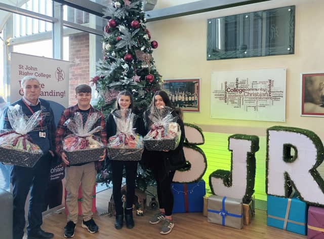 Students at St John Rigby College have been delivering Christmas hampers