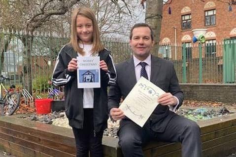 Competition winner Gabriel Rose Unsworth with Chris Green MP