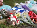Tributes left outside the home of Arthur Labinjo-Hughes in Solihull