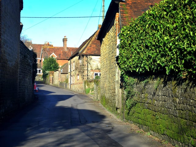The parish is a long thin strip running north to south, from the slopes of Blackdown in the north to Gallows Hill on the border with Graffham south of the River Rother.