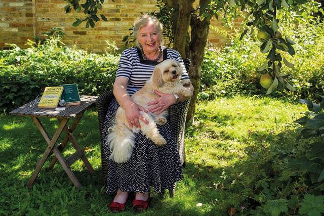 Elizabeth is now retired and does charity work for the Thorpe Hall Sue Ryder hospice. She is pictured by Chris Porsz in her Thorney garden.