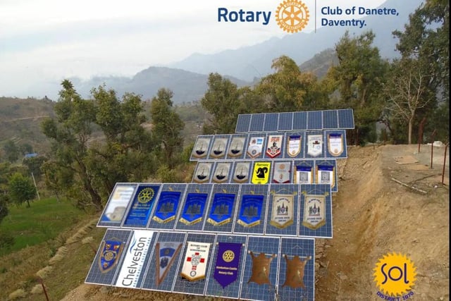 Rotary banners are displayed on the solar panels.