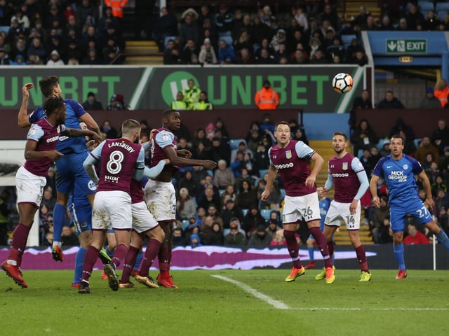 Posh delivered a superb display in a third round FA Cup tie at Villa Park after falling behind to an early goal against the Championship promotion favourites. Goals from Jack Marriott (2) and Ryan Tafazolli (pictured) turned the game on its head in the final 15 minutes. Posh were thumped at home by Leicester City in the fourth round and, seven weeks after beating Villa, McCann was sacked.