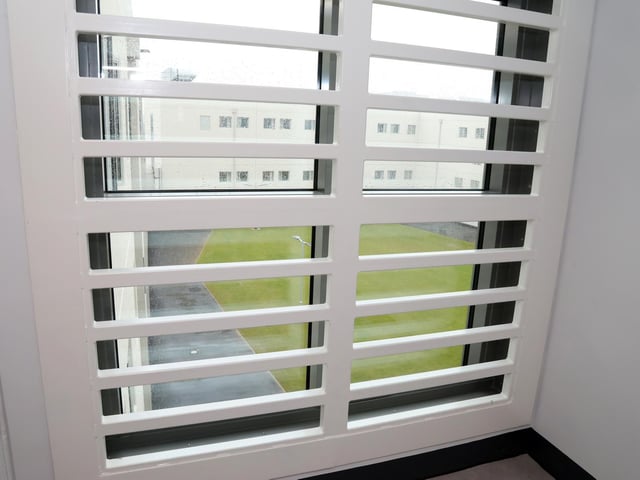 Bars on the accommodation blocks and windows that don't open prevent drones from delivering illegal goods over the walls