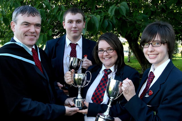 Headmaster David Funston, with pupils who received awards at the Lisneal College annual Prize Giving.  From left are Jason Lynch, awards in Science, Technology and Design and Information Technology, Emma Willis, Religious Education and Heather Taylor, Music cup. LS44-707MT.
