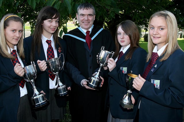 Headmaster David Funston, with pupils who collected awards at the Lisneal College annual Prize Giving.  From left are  Mandy Hutchinson, Maths prize, Hannah Cammack, French cup, Charlotte Pilling Year 9 Poetry trophy and  Kerry Falconer, Music cup.  LS44-508MT.
