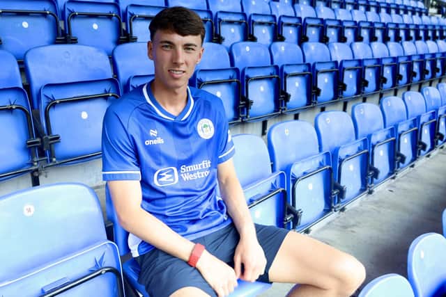 Chris Sze will be with Latics for at least the next 12 months