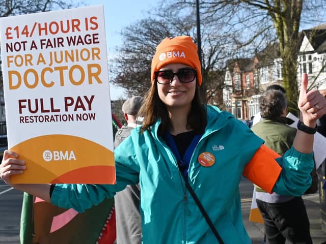 Junior doctor Behnaz Pourmohammadi on the picket line outside Wigan Infirmary during industrial action earlier this month