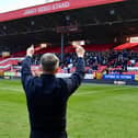Ryan Lowe salutes the Latics fans at Charlton on Saturday