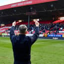 Ryan Lowe salutes the Latics fans at Charlton on Saturday