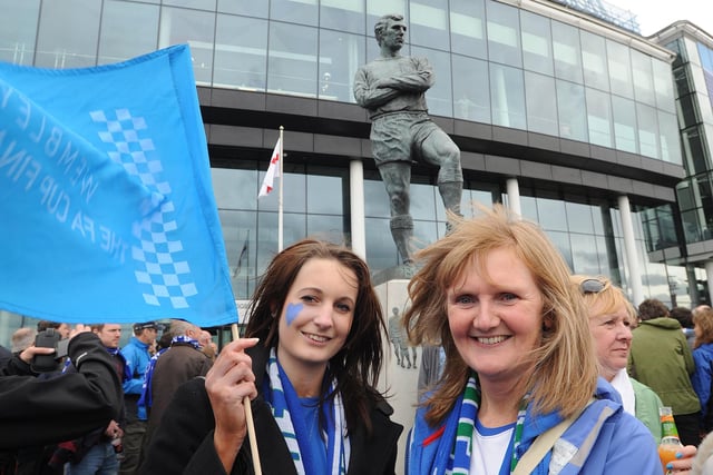 Lucy Macfarlin, from Appley Bridge, and Janet Higham, from Shevington at the Bobby Moore Statue