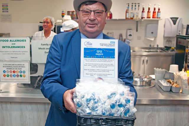 John Winnard, joint managing director at William Santus & Co Ltd, with the blue Uncle Joe's mint balls made for Wrightington, Wigan and Leigh Teaching Hospitals NHS Foundation Trust