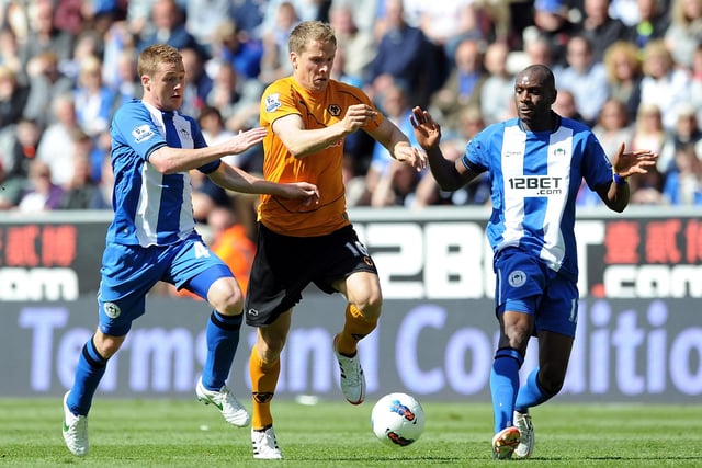 James McCarthy (L) and Emmerson Boyce of Wigan Athletic in action with David Edwards (C) of Wolverhampton Wanderers during the Barclays Premier League match between Wigan Athletic and Wolverhampton Wanderers at DW Stadium on May 13, 2012 in Wigan, England.  (Photo by Chris Brunskill/Getty Images)
