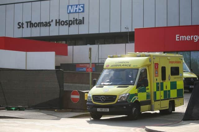 An ambulance leaves St Thomas' Hospital in central London, where Prime Minister Boris Johnson is in intensive care with symptoms of the novel coronavirus COVID-19 (Photo: ISABEL INFANTES/AFP via Getty Images)
