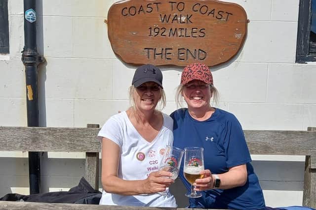 Alison Corkill and Susan Bridgeman celebrate completing the coast-to-coast walk