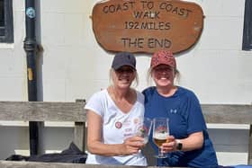 Alison Corkill and Susan Bridgeman celebrate completing the coast-to-coast walk