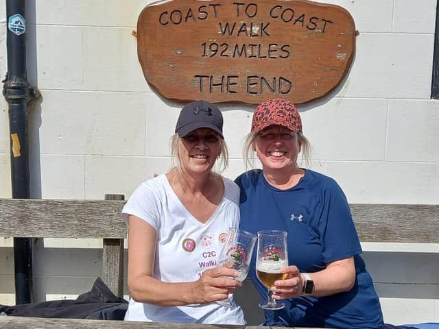 Alison Corkill and Susan Bridgeman celebrate completing the coast-to-coast walk