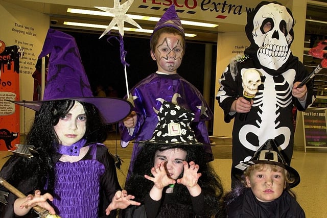 Tesco Extra fancy dress winners are: Kelly and Tara Griffin (1st), wizard Troy Bartlett (2nd) and skeleton Jonathan Siney (3rd) along with his sister Hannah.