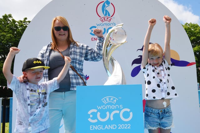 Suzy Ratcliffe with Jaxon, five, and Allana, eight, right, pictured with the Women's Euro 2022 trophy,
