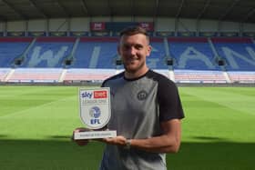 Charlie Wyke with his Player of the Month award