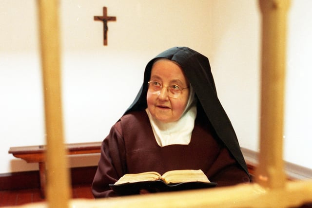 Reverend Mother Sister Marie at study in the Carmelite convent at Roby Mill - pictured for the 80th anniversary in 1997.